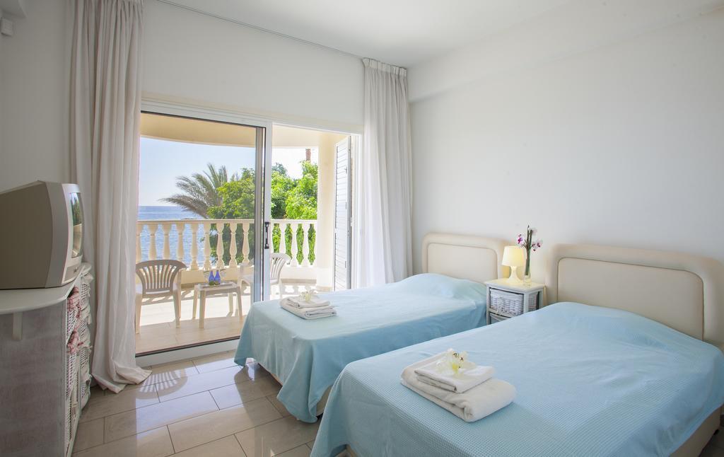 Meneou Beachfront Villa Sunset Periwolia Pokój zdjęcie